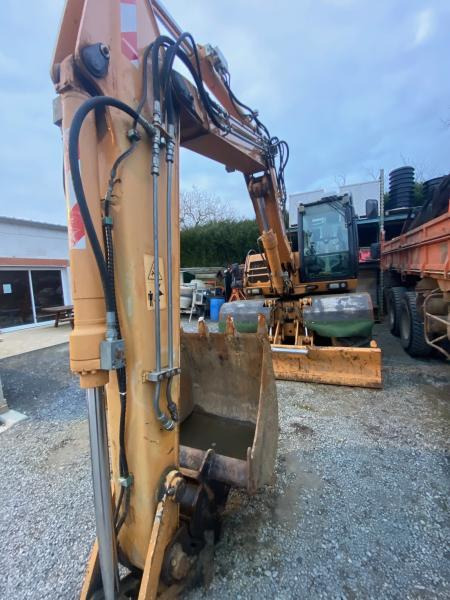 Case WX125 - Pelle sur pneus: photos 4 Case WX125 - Pelle sur pneus: photos 4