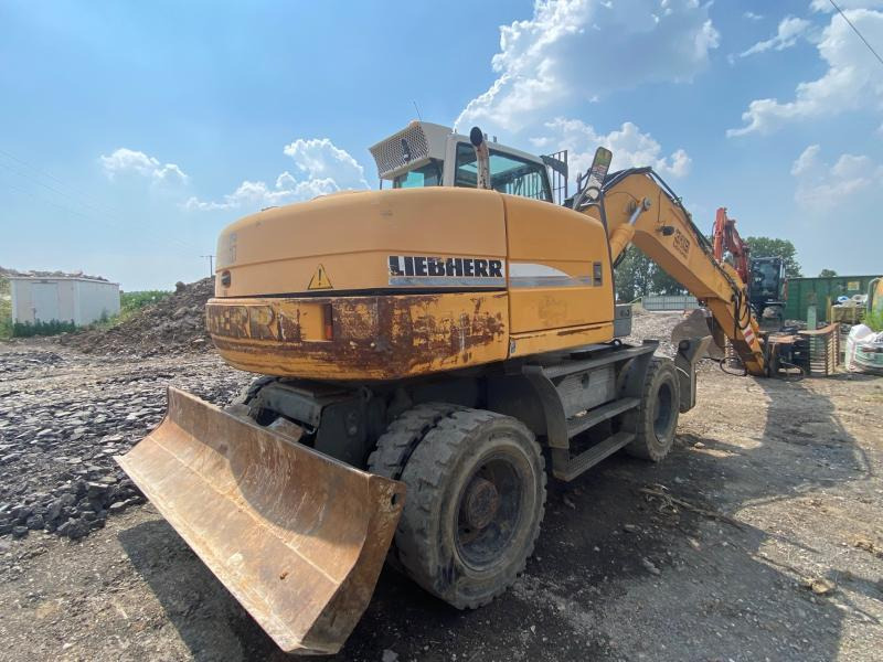 Liebherr A316Litronic - Pelle sur pneus: photos 5 Liebherr A316Litronic - Pelle sur pneus: photos 5
