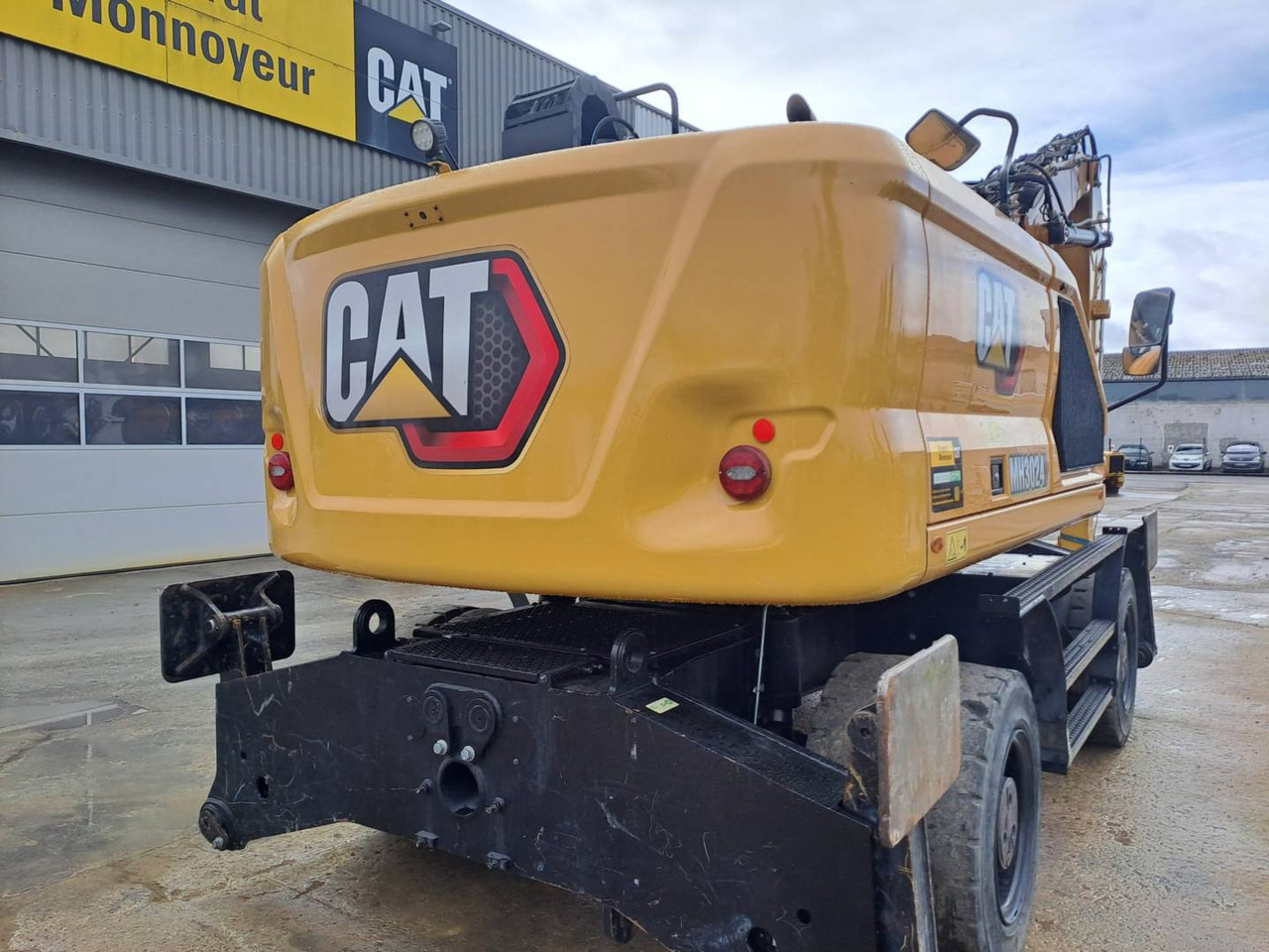 CAT MH3024 - Pelle sur pneus: photos 3 CAT MH3024 - Pelle sur pneus: photos 3