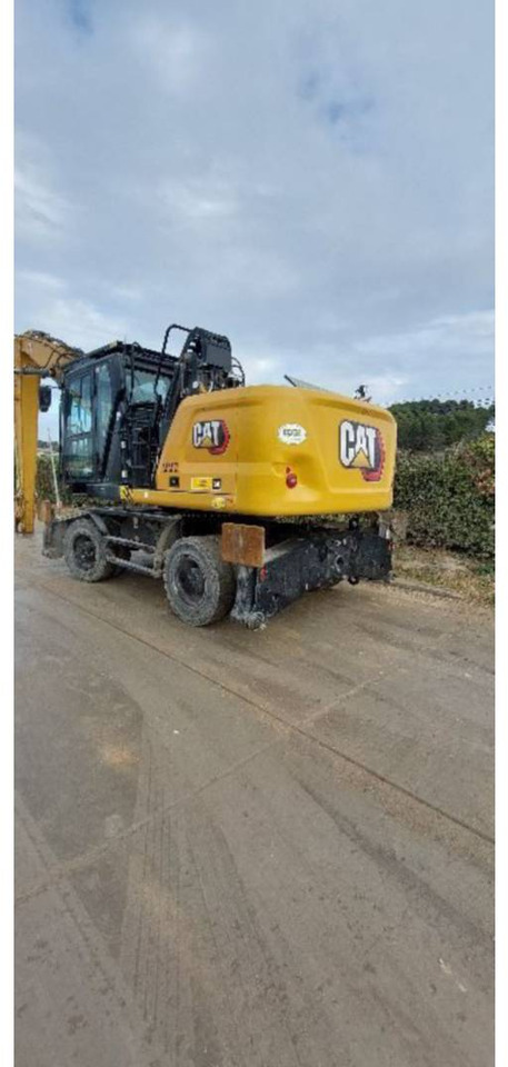 CAT MH3026 - Pelle sur pneus: photos 2 CAT MH3026 - Pelle sur pneus: photos 2