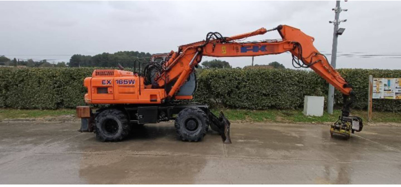 Pelle sur pneus FIAT ALLIS / NEW HOLLAND EX165W: photos 9