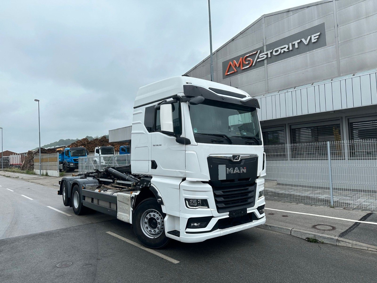 MAN TGX 26.510 6X2-4BL intarder, - Camion ampliroll: photos 1 MAN TGX 26.510 6X2-4BL intarder, - Camion ampliroll: photos 1