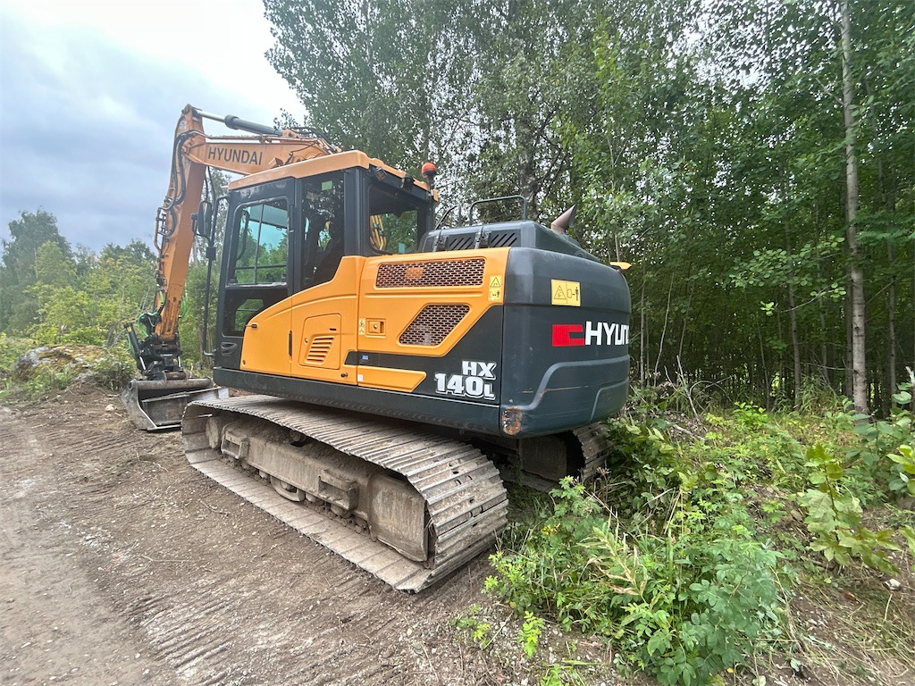 Pelle sur chenille Hyundai HX140L: photos 7