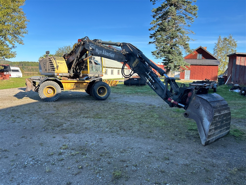 Volvo EW140B - Pelle sur pneus: photos 2 Volvo EW140B - Pelle sur pneus: photos 2