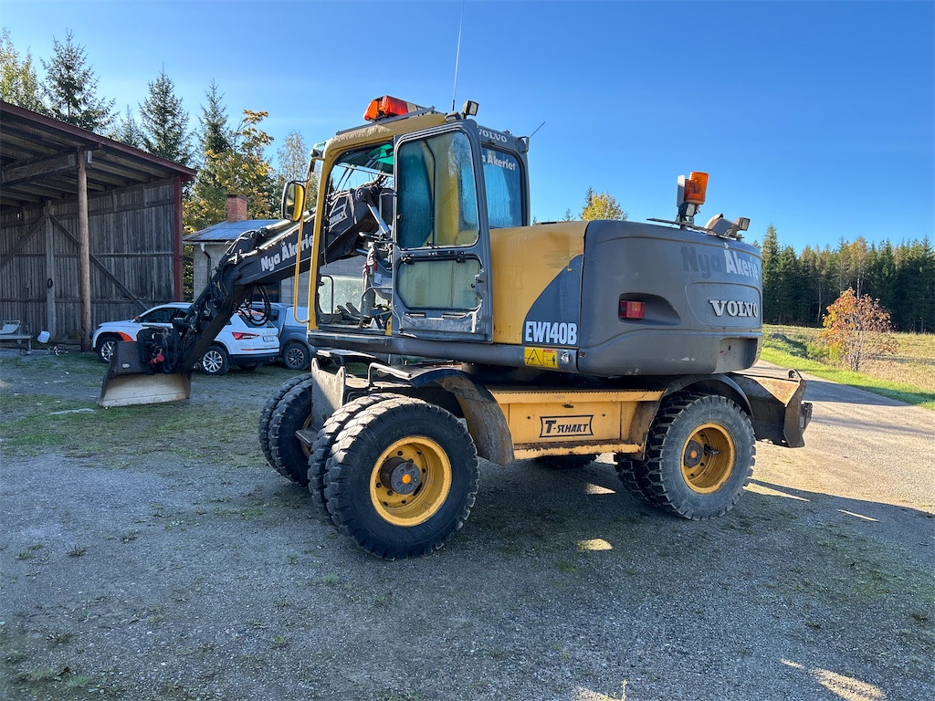 Volvo EW140B - Pelle sur pneus: photos 5 Volvo EW140B - Pelle sur pneus: photos 5