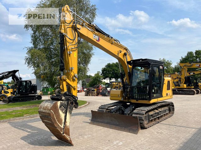 Pelle sur chenille Cat 313GC