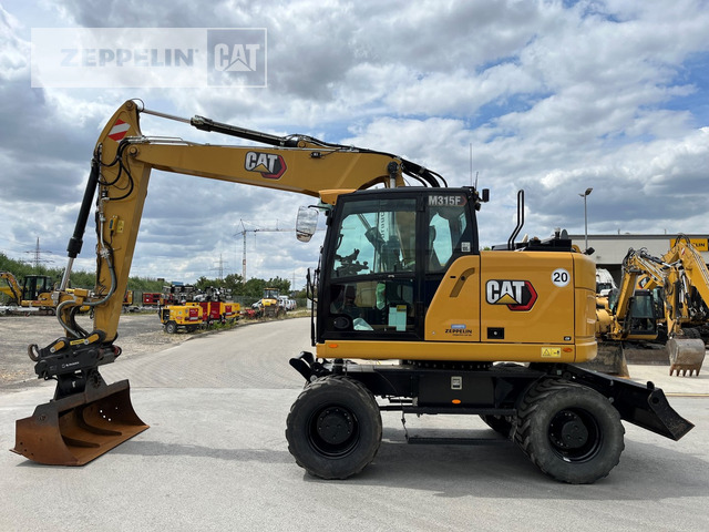 Cat M315F - Pelle sur pneus: photos 2 Cat M315F - Pelle sur pneus: photos 2
