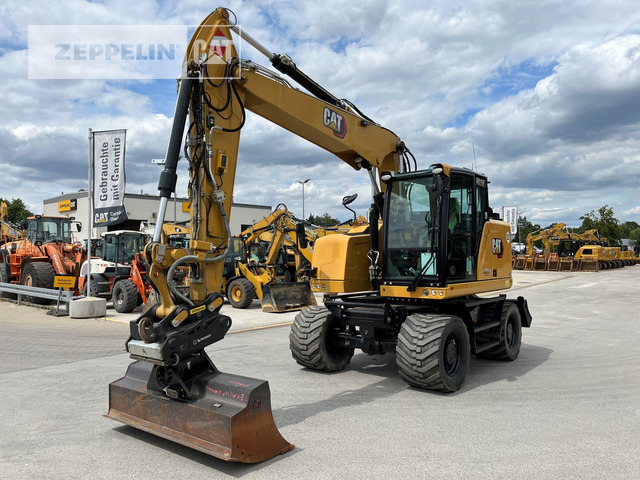 Cat M315F - Pelle sur pneus: photos 1 Cat M315F - Pelle sur pneus: photos 1