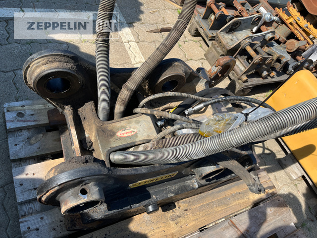 Oil-Quick OQ65 M312-M318F - Attache rapide pour Engins de chantier: photos 1 Oil-Quick OQ65 M312-M318F - Attache rapide pour Engins de chantier: photos 1