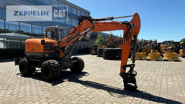 Wacker EW100 - Pelle sur pneus: photos 1 Wacker EW100 - Pelle sur pneus: photos 1